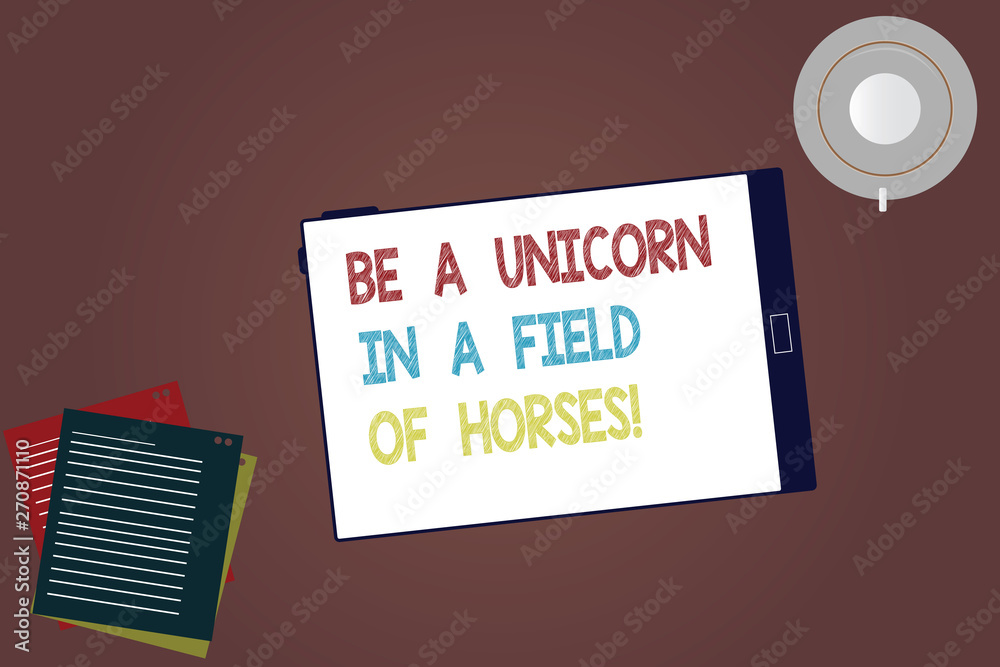 Word writing text Be A Unicorn In A Field Of Horses. Business concept for Make the difference being special Tablet Empty Screen Cup Saucer and Filler Sheets on Blank Color Background Word writing text Be A Unicorn In A Field Of Horses. Business concept for Make the difference being special Tablet Empty Screen Cup Saucer and Filler Sheets on Blank Color Background