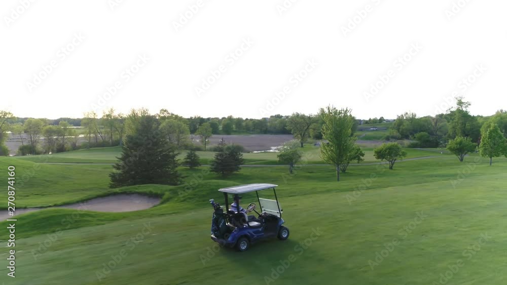 Aerial Shot Following Golfer Driving Cart Aerial Shot Following Golfer Driving Cart