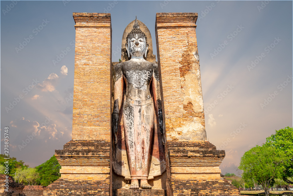 Sukhothai Wat Mahathat Buddha statues at Wat Mahathat ancient capital of Sukhothai, Thailand. Sukhothai Historical Park is the UNESCO world heritage