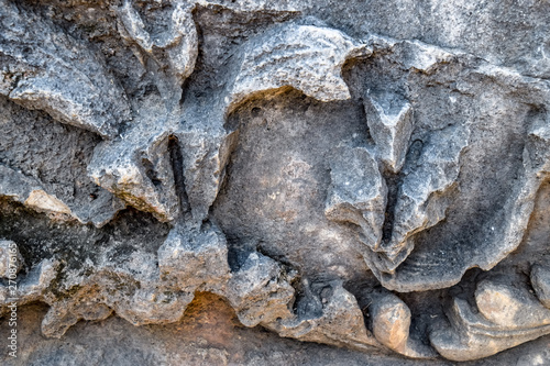 The element of the gate of Hadrian on the ground near the gate. Ruins of ancient construction. photo