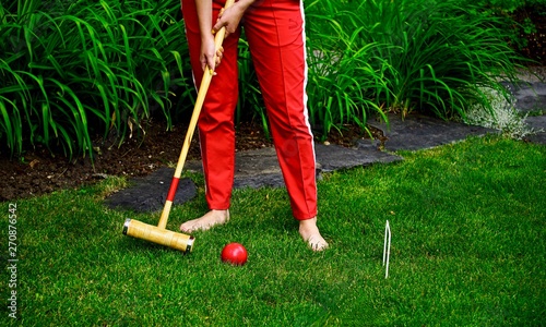 Konstfotografi person playing croquet