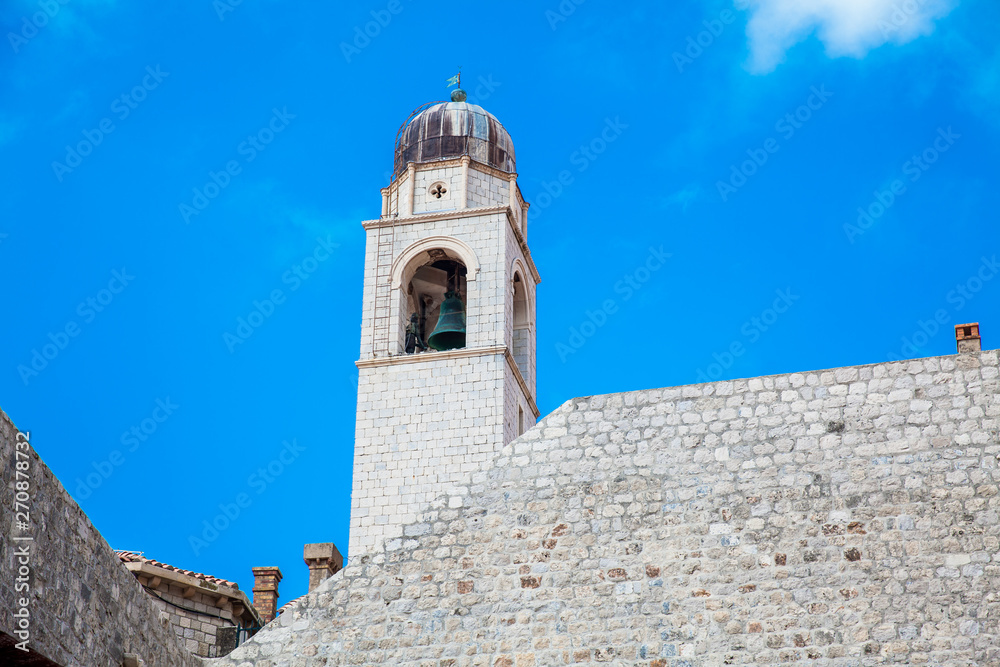 Clock tower of Dubrovnik old town seen from the city old port