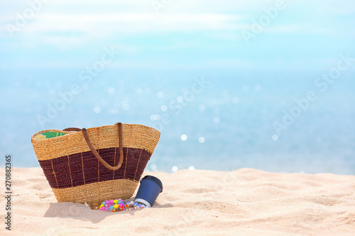 Beach Accessories with coffee paper cup on beach - Summer Holidays