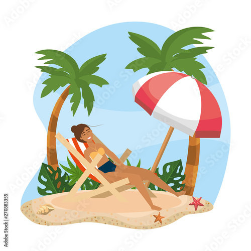 woman taking sun in the tanning sun with umbrella in the beach