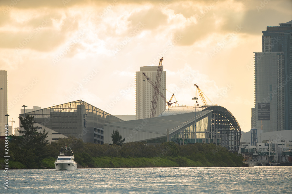 Fototapeta premium Royal Caribbean cruise terminal at Port Miami sunset in background