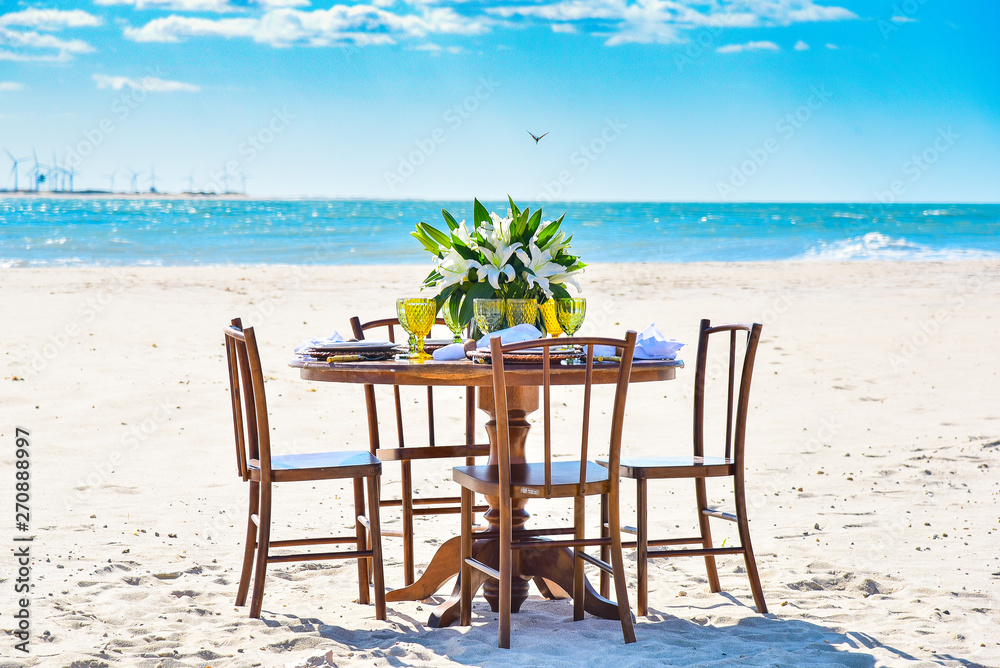 table and chairs on the beach, beach restaurant, romantic lunch by the sea, Tourinhos, RN, Brazil, brazilian beach, beach in sunny day, northeastern brazilian beach, brazilian summer, horizon line