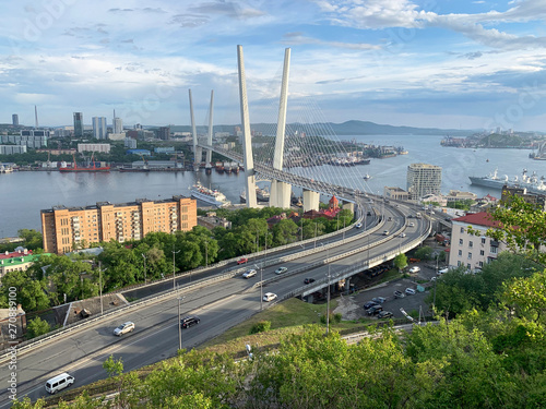 Russia, Vladivostok. Evening summer view of the city from the "Eagle's nest" hill in cloudy weather