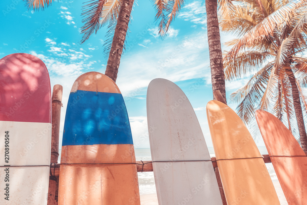 Surfboard and palm tree on beach background. Stock Photo | Adobe Stock