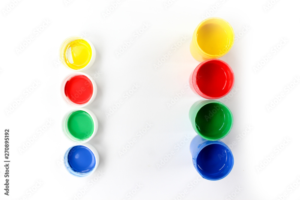 Set gouache paints for children isolated on a white background Set gouache paints for children isolated on a white background