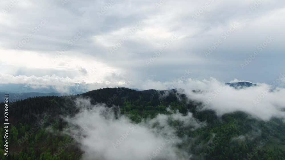 Clouds over rain forest jungle. Aerial view of rainforest. Clouds over rain forest jungle. Aerial view of rainforest.