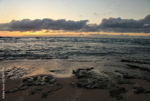 Dusk and sun setting over a beautiful ocean