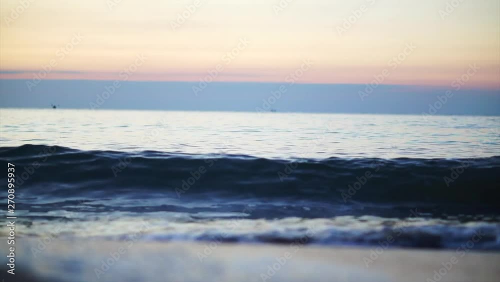 Abstract sea ocean horizon wave movement sunrise sand shore