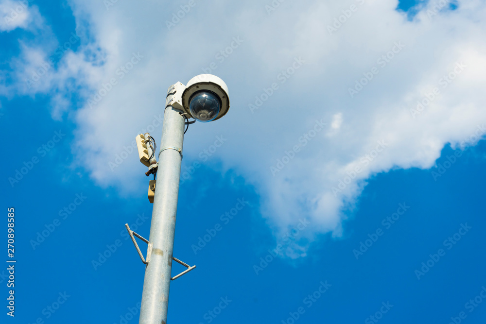 Outdoor surveillance camera on a pole