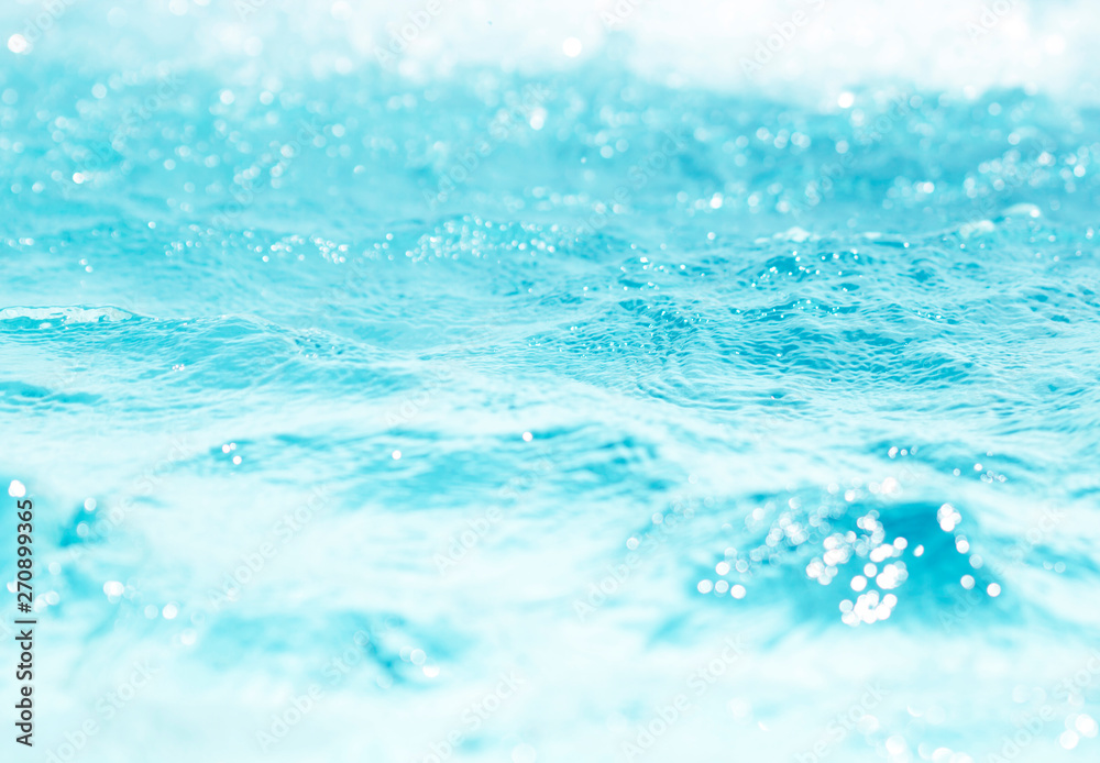 Blurred water, glittering bokeh abstract; background nature Blurred water, glittering bokeh abstract; background nature