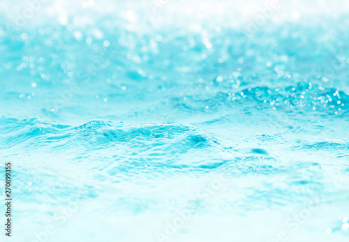 Blurred water  glittering bokeh abstract  background nature