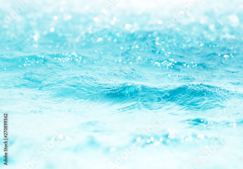 Blurred water  glittering bokeh abstract  background nature