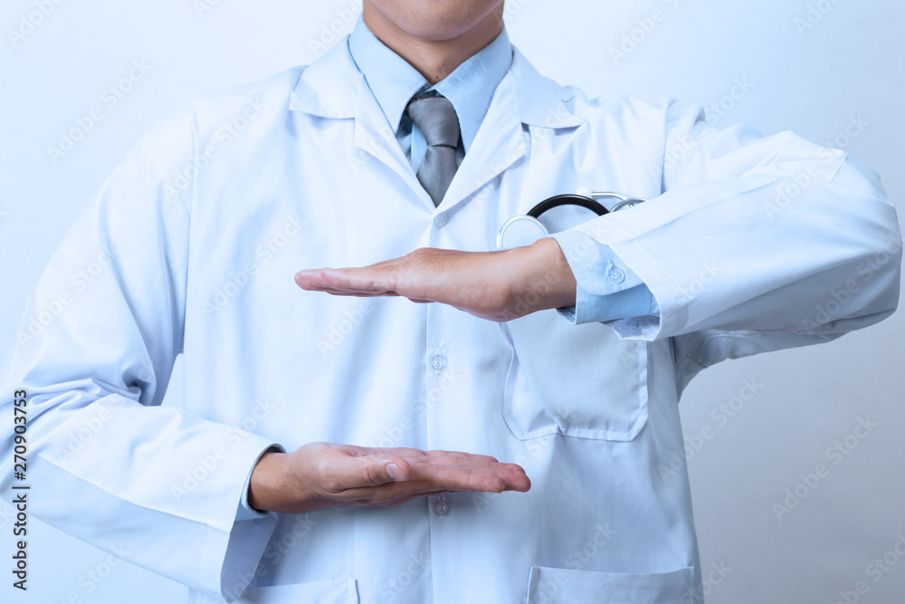 Doctor, medical professional holding something in empty hand Doctor, medical professional holding something in empty hand