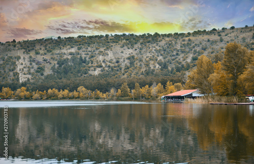 landscape with lake and forest in autumn