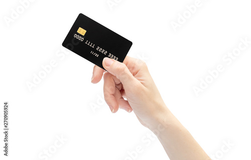 Woman's hand holding credit card. Isolated on white.