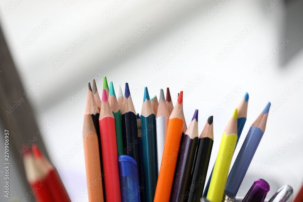 Bunch of various pencils stand in holder Bunch of various pencils stand in holder