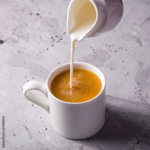 Canvastavla Masala tea in white minimalist cups on a gray table