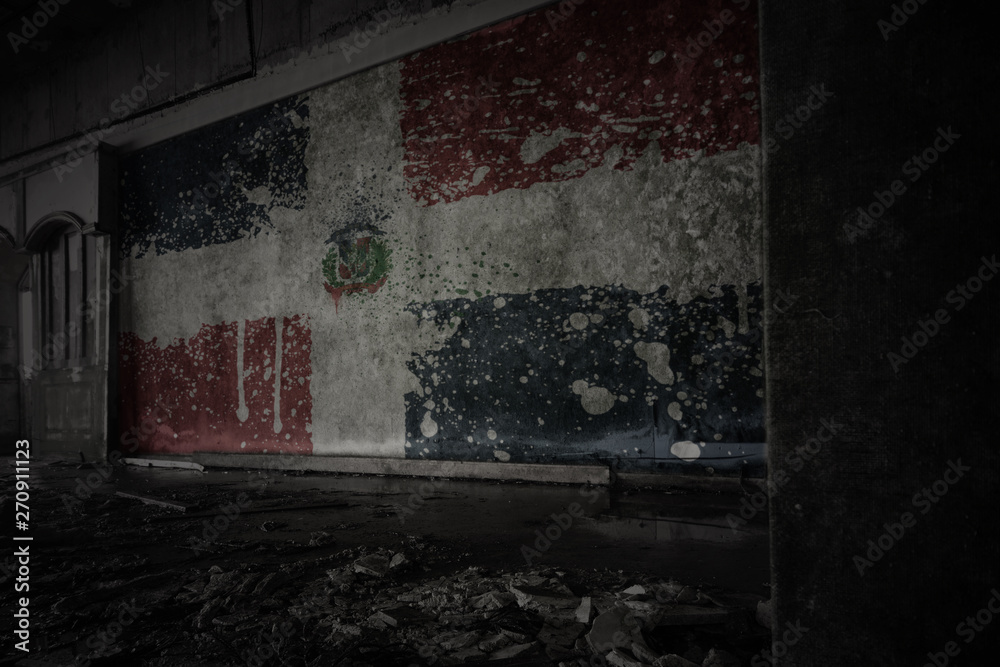 painted flag of dominican republic on the dirty old wall in an ...