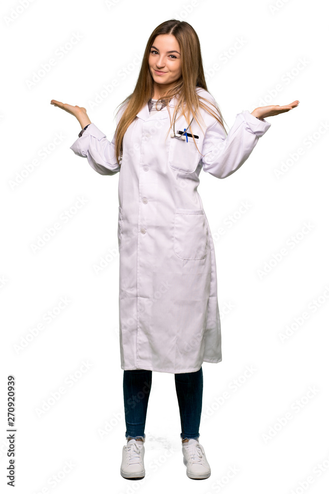 Full body Young doctor woman making unimportant gesture while lifting the shoulders on isolated background Full body Young doctor woman making unimportant gesture while lifting the shoulders on isolated background