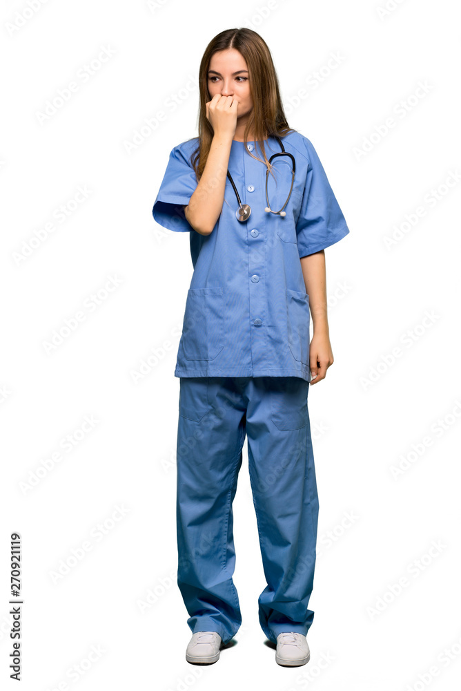 Full body Young nurse having doubts on isolated background Full body Young nurse having doubts on isolated background