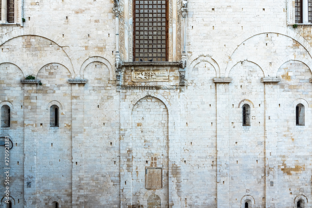 Stone walls of the medieval cathedral of San Nicolas di Bari.