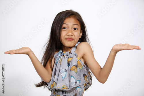Bild auf Leinwand Pretty asian girl in butterflies dress apologizes