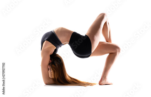 Young dance girl over isolated white background .