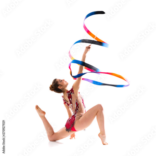 Fotografie Girl doing rhythmic gymnastics with ribbon .