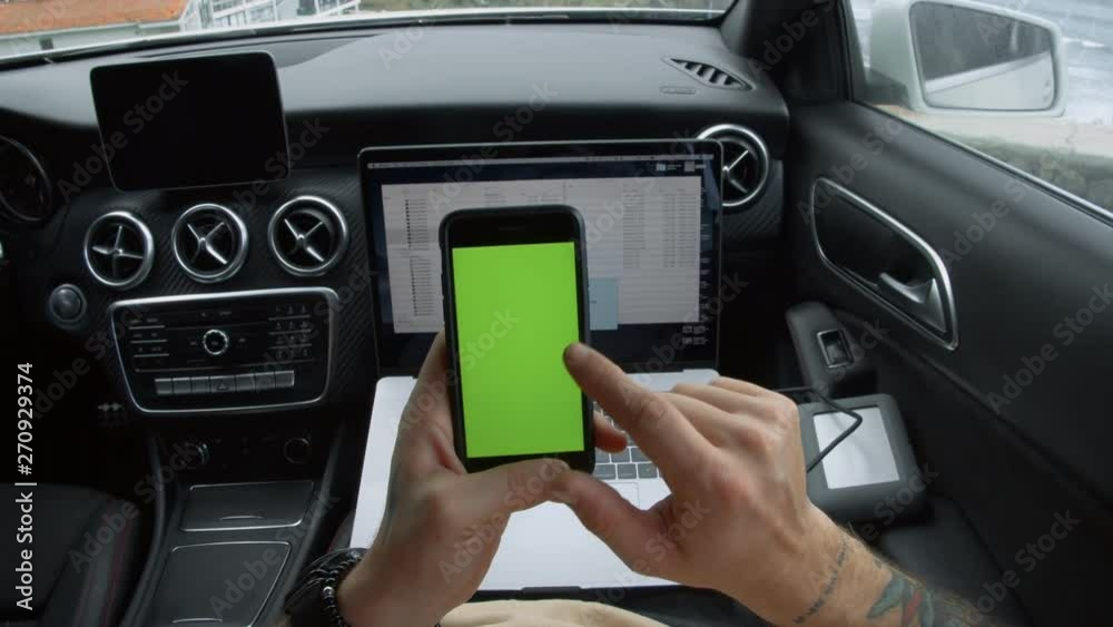 Young nomad creative professional of digital world generation, works remotely from laptop while travels in car, connected to internet network and harddrive for data storage. swipes chromakey screens Young nomad creative professional of digital world generation, works remotely from laptop while travels in car, connected to internet network and harddrive for data storage. swipes chromakey screens