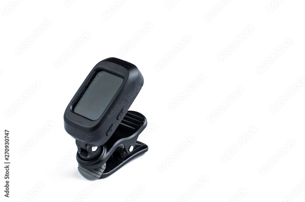 Tuner for guitar isolated on white background.Copy space Tuner for guitar isolated on white background.Copy space