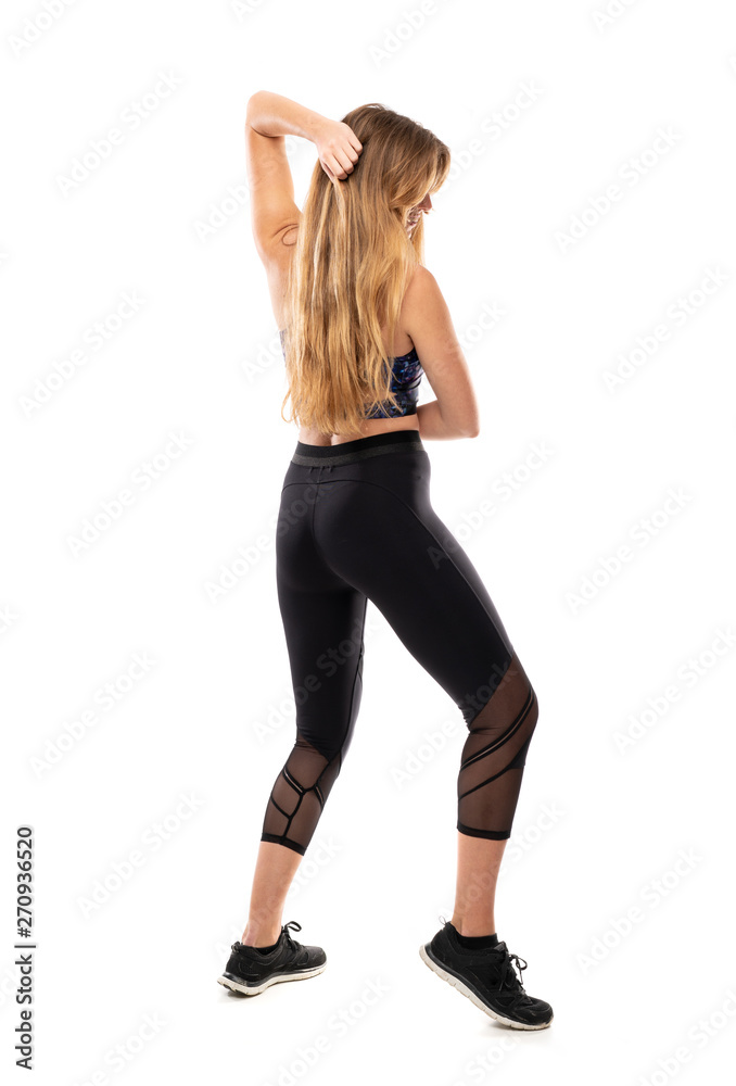 Ballerina dancing over isolated white background Ballerina dancing over isolated white background