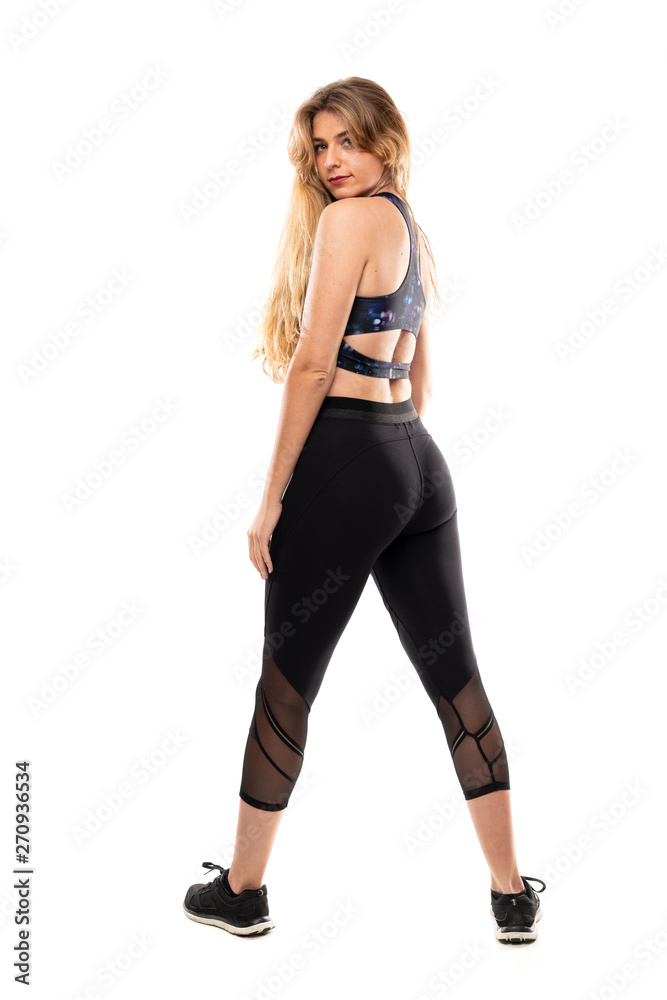 Blonde Sport Woman over isolated white background Blonde Sport Woman over isolated white background