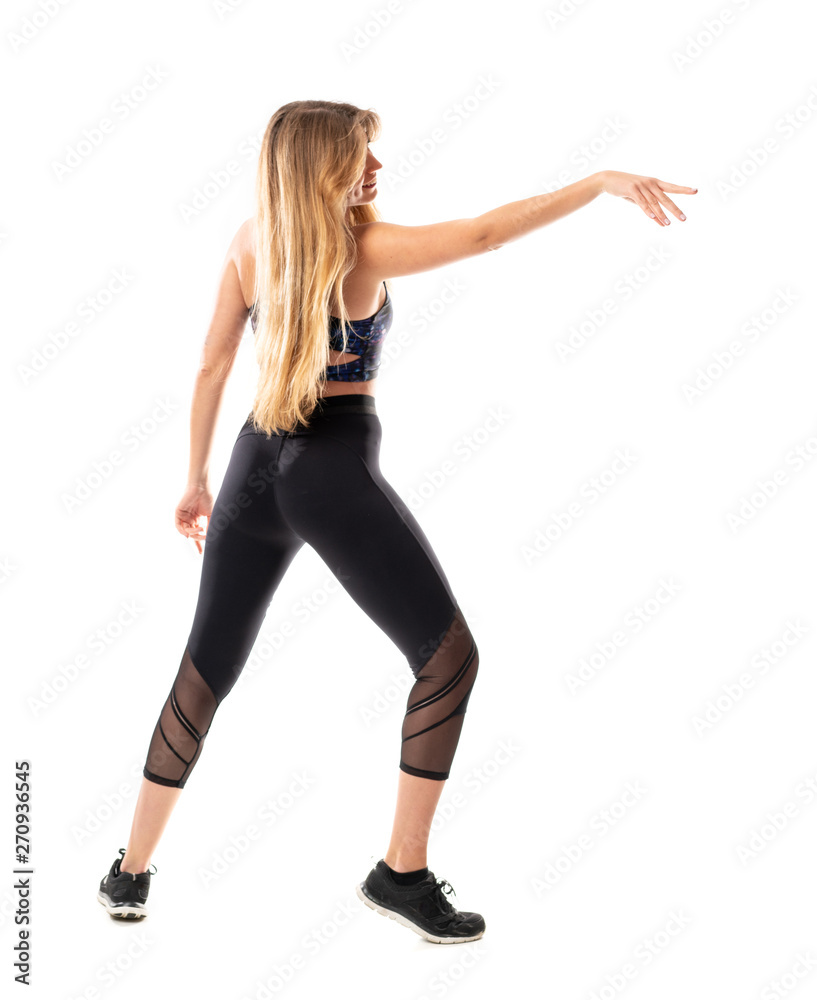 Ballerina dancing over isolated white background Ballerina dancing over isolated white background