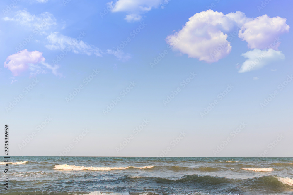 Empty beautiful sand beach with blue sky and cloud background. Tropical sea and summer beach.