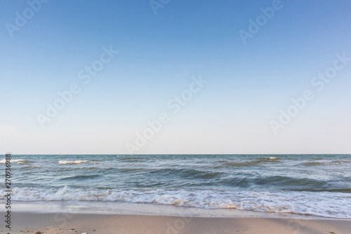 Fototapeta Naklejka Na Ścianę i Meble -  Empty beautiful sand beach with blue sky and cloud background. Tropical sea and summer beach.