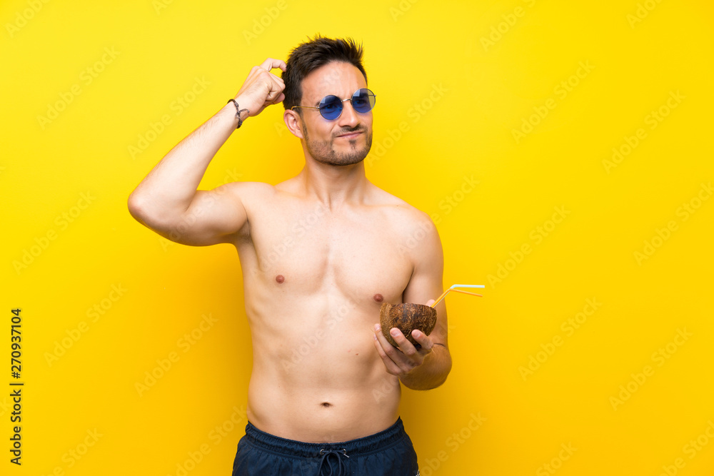 Handsome young man in summer clothes having doubts and with confuse face expression Handsome young man in summer clothes having doubts and with confuse face expression