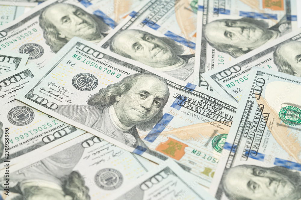 close up US one hundred dollars bills money, business and financial concept close up US one hundred dollars bills money, business and financial concept