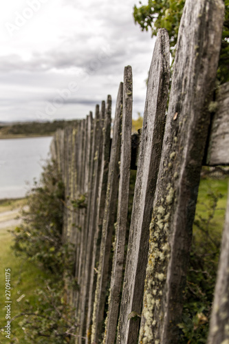 Wooden fence at the lake  Ushuaia  Argentina