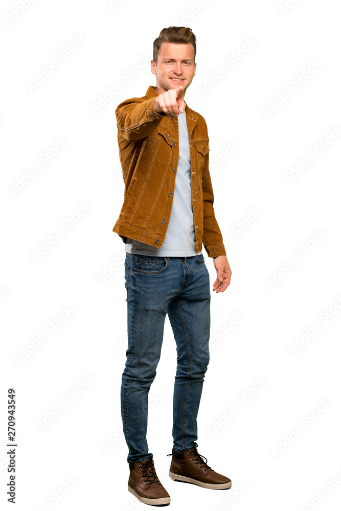 Blonde handsome man points finger at you with a confident expression