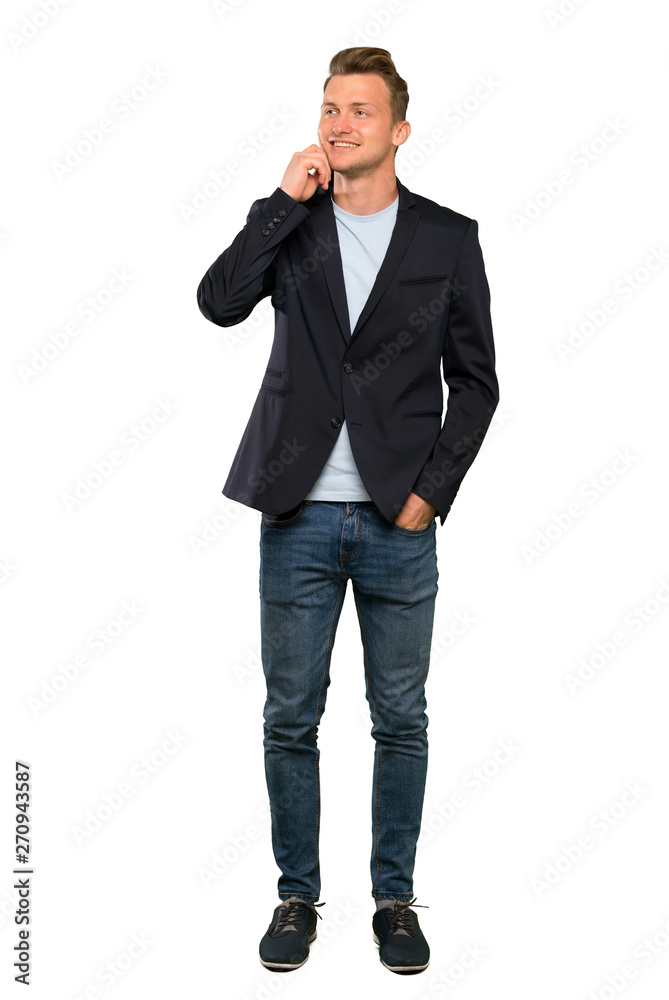 Blonde handsome man thinking an idea while looking up Blonde handsome man thinking an idea while looking up