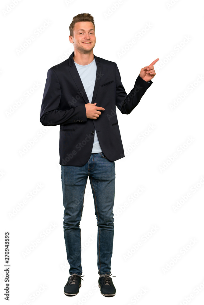 Blonde handsome man pointing finger to the side Blonde handsome man pointing finger to the side