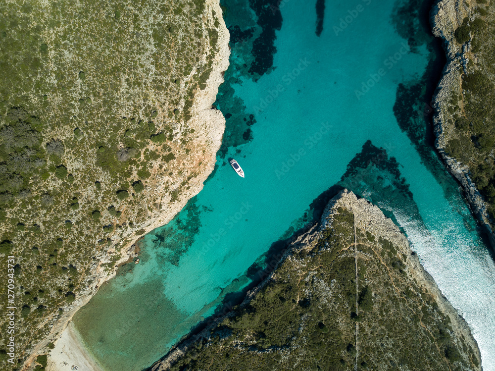 Boat in a bay from above