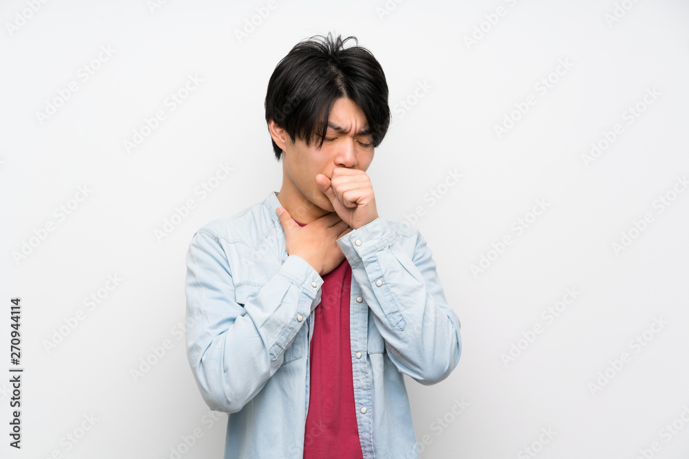 Asian man on isolated white background is suffering with cough and feeling bad Asian man on isolated white background is suffering with cough and feeling bad