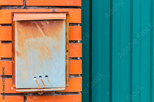 A beautiful mailbox hangs waiting for newspapers, parcels and letters. © Vlad Savin
