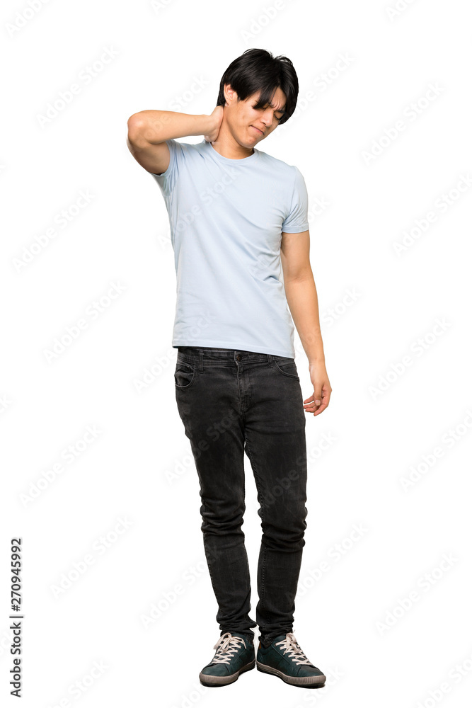 A full-length shot of a Asian man with blue shirt with neckache over isolated white background A full-length shot of a Asian man with blue shirt with neckache over isolated white background