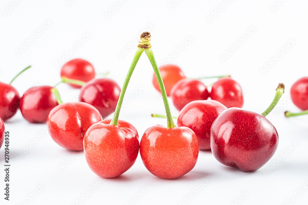 Fresh red cherries on white background Fresh red cherries on white background